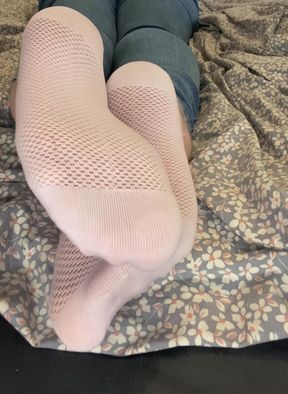 Cute sock enthusiast enjoys small feet