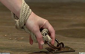 Dyke tied to the floor ass whipped
