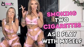 Smoking two cigarettes as I play with myself