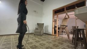 Bullwhipping in leather from head to toes by Goddess Khaina