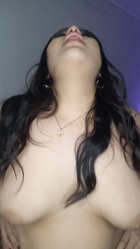 Busty babe shows off her big tits