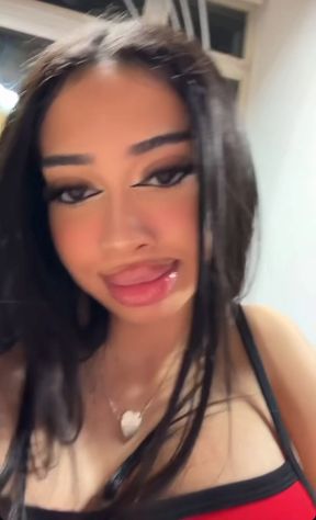 Busty bimbo flaunts fake huge tits