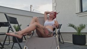 SMOKING ON A SUN LOUNGER WHILE RAIN FALLS ON ME