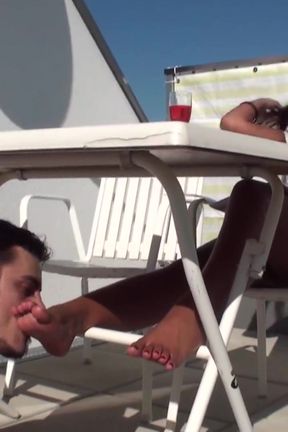 Interracial foot worship in the sun