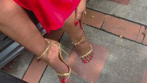 Balbina trying to start the chevrolet corsa while wearing gold saralissima heels