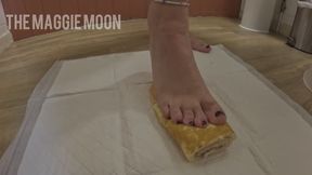 Maggie Moon smooshing cake with her perfect feet