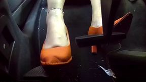 Driving in Orange Heels with one foot on the accelerator and one foot on the brake (Part 1)