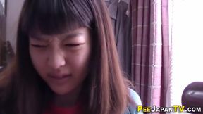 Japanese Teen Brunette Busts a Pee in a Plastic Goblet