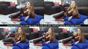 Angie smoking a cognac cigar in low cut top, leather pants and high heels!