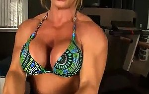 Mature female bodybuilder works out naked