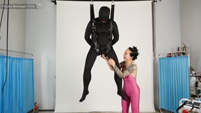 Zentai Suspension With Mid-Air Handjob and Anal Play!