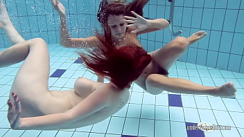 Two sensual babes Lucy and Katrin swimming naked