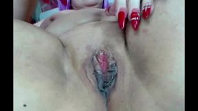 very close-up shots of a mature slut s pussy with purple hair and other parts of her slutty body...))
