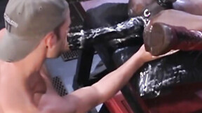 Over on a red workbench, Michael Brandon dives full-on into Simon Cox's satisfying