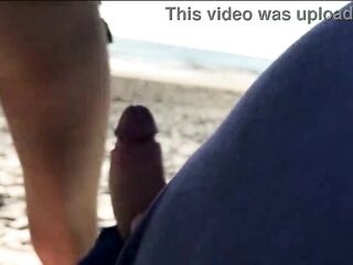 Stranger gives oral job and booty bang right on the beach