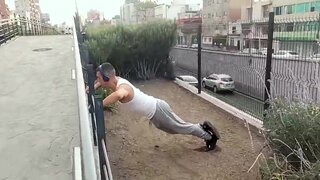 Muscular guy works out and meets with a street agent