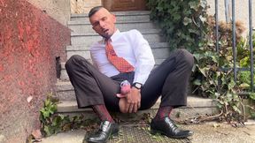 Kinky gentleman slave spread legs and plays with his ass in a car in public