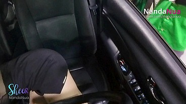 NandaNua teasing the gas station attendant by flashing her tits using a transparent blouse