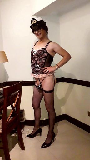 Crossdresser Fernanda Gomez modeling lingerie in hotel