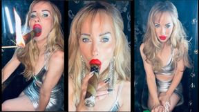 Your Queen smokes a Giant cigar in sexy pvc dress