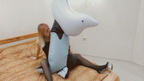 Alla inflates a big inflatable whale with her mouth and fucks him hot!!!