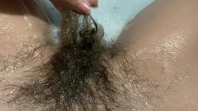 Hairy bush underwater in the bathtub