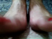 Red long toenails teasing