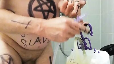 Satan slave is ready for his Enema sacrifice