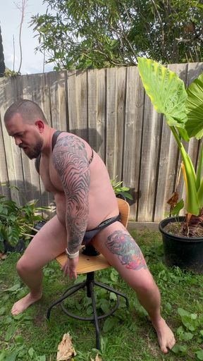 Stud Rides Dildos in the Backyard