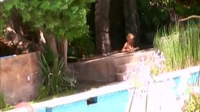 He Is Lying by the Pool When She Sits on His Cock