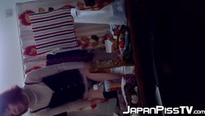 Japanese Babe Pisses on Floor and Gets Cleanup in Her Own Hand