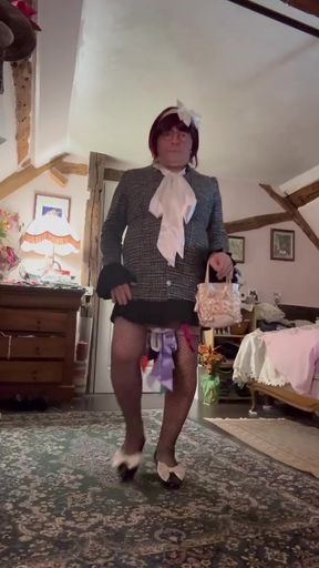 Dressed in a short front-buttoned dress for an evening