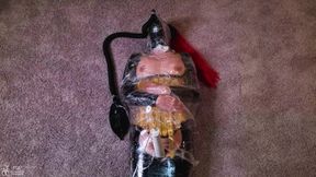 RubberDoll Gets Mummified & Made to Cum: A Latex Loving Girl Wrapped in Plastic Cums on a Magic Wand