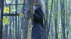 Mesmerizing curly haired blonde teen in the woods shows her goodies