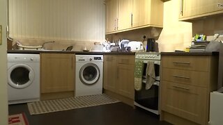 kitchen making coffee and washing up
