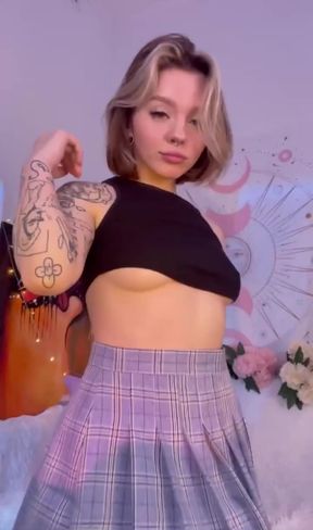 Female Onlyfans Model in Skirt
