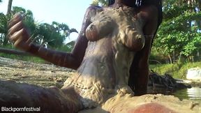 Solo woman with perfect ebony tits wets herself in the forest.