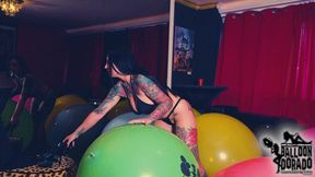 Megan pops a lot of huge Loonerworld Balloons with her High Heels HD Version