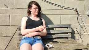 Sara smoking outdoor
