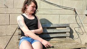 Sara smoking outdoor