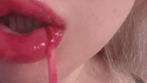 Red lipstick gloss is captivating!