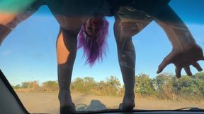 Temptation on the Windshield of a Car