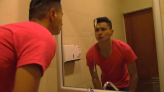 He masturbates and pulls the cum in the MIRROR of a public bathroom