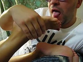 Randy fellow licking his seductive woman's amazing feet in heels