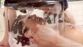 Japanese Beauty Seduces Hunk in Steamy Wet Bath Sex Encounter