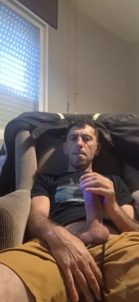 Guy masturbating on the sofa
