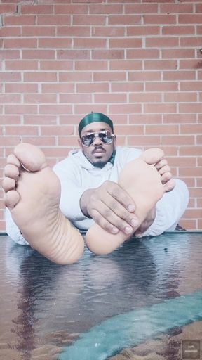 I Expose My Feet and I Touch Them