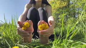 Footfetish in the park on the grass