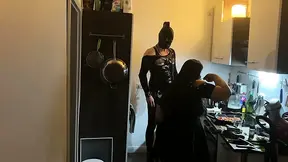 Fetish chick dominates her friend in kinky kitchen encounter