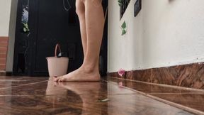 Katherine barefoot teasing while cleaning the house